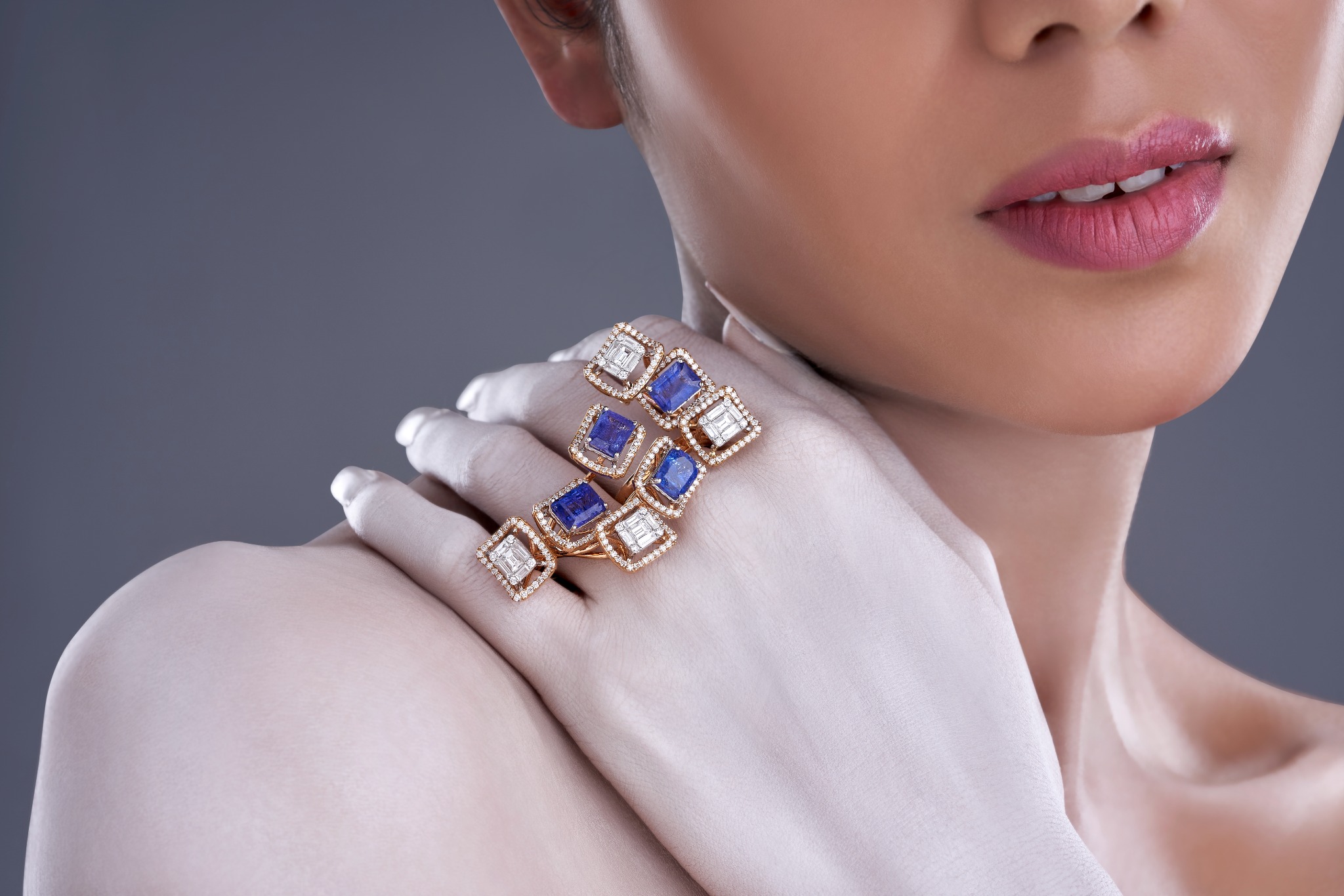 Diamond and blue gemstone architectural ring